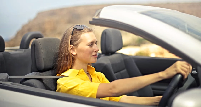 A woman driving a car